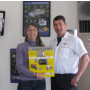 Ken & Robin Comforto.  The quarterly drawing winner of a Nikon Cool Pix 3100 kit with case and memory card.